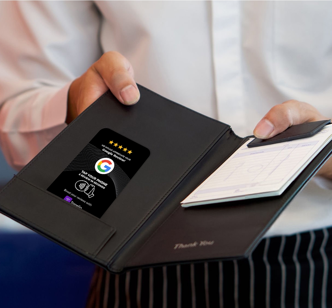 waiter presenting tapelio google review card with check